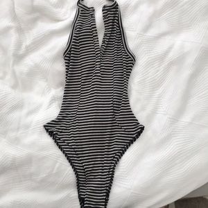 Out from under bodysuit